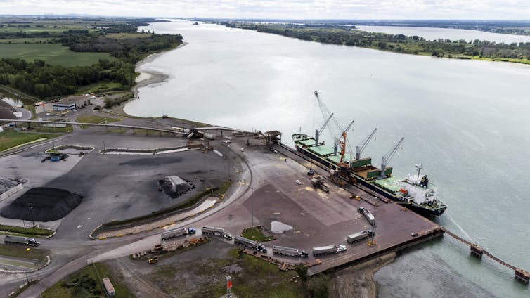 An aerial view of a ship docked at a port